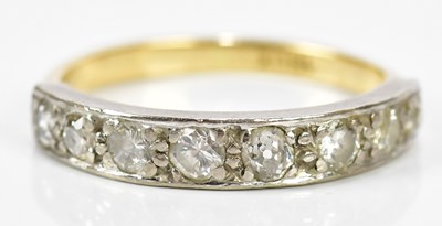 Lot 149 - An 18ct yellow gold eight stone diamond half...