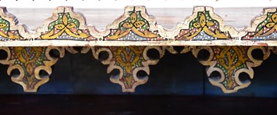 Lot 43 - A Moorish ornate painted wooden shelf with...