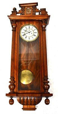 Lot 135 - A mahogany cased Vienna wall clock with dual...