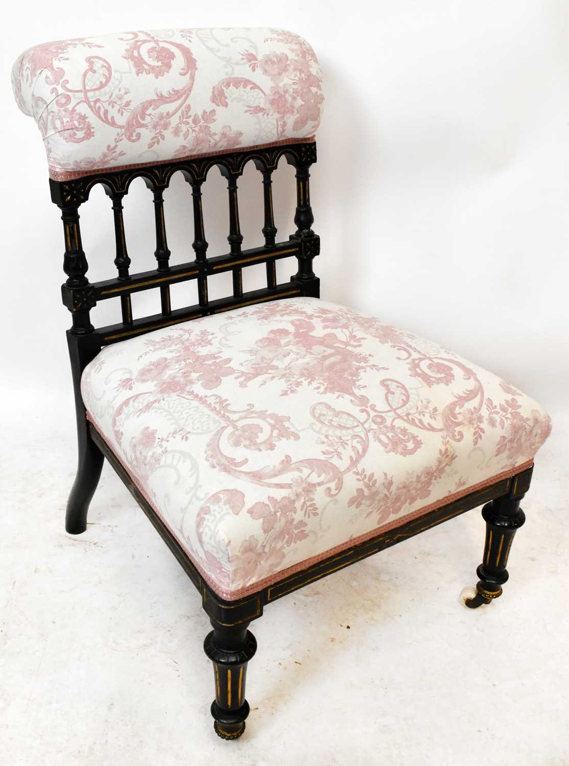 Lot 1552 - An Aesthetic style ebonised and gilt salon...