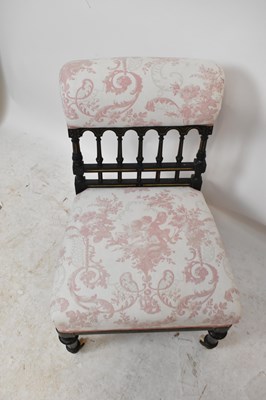 Lot 1552 - An Aesthetic style ebonised and gilt salon...