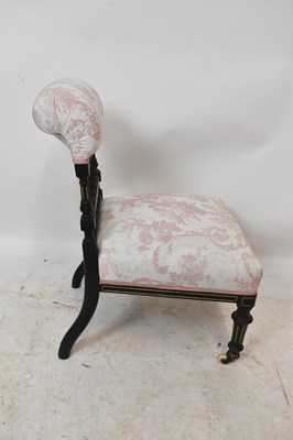 Lot 1552 - An Aesthetic style ebonised and gilt salon...