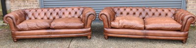 Lot 9 - A pair of modern brown leather button...