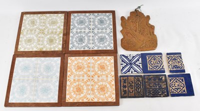 Lot 516 - A set of three Hebrew tiles, two further...