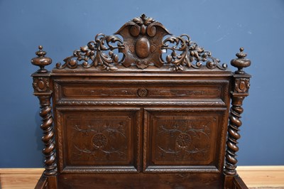 Lot 3 - A Victorian carved oak double bed, with...