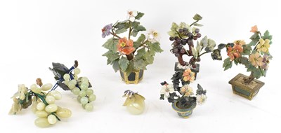 Lot 644 - A group of four Chinese style hardstone flower...