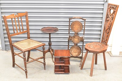 Lot 73 - A 1920s oak and three tier folding cake stand,...