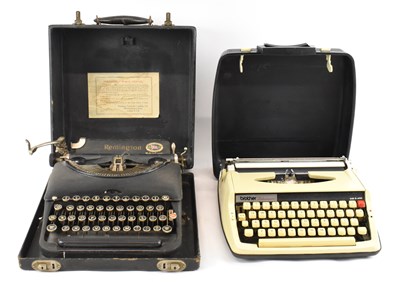 Lot 346 - A cased Remington typewriter and another cased...