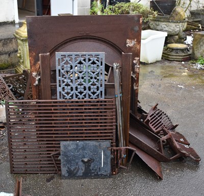 Lot 376 - A cast iron fireplace insert, together with...