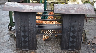 Lot 377 - A cast iron fire grate, height 60cm, width...