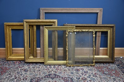 Lot 2580 - A collection of five gilt picture frames,...