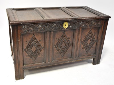 Lot 79 - An 18th century panelled oak coffer with...