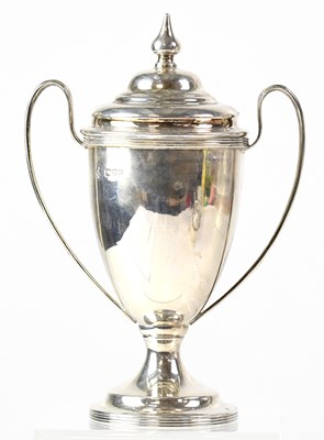 Lot 591 - A George V hallmarked silver lidded trophy...