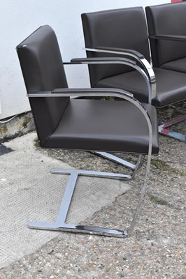 Lot 24 - A set of eight chrome framed office chairs.