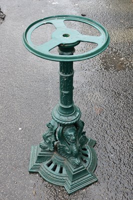 Lot 383 - A green painted cast iron table base,...