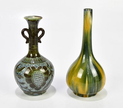 Lot 1279 - BARUM WEAR; a twin handled vase, decorated...