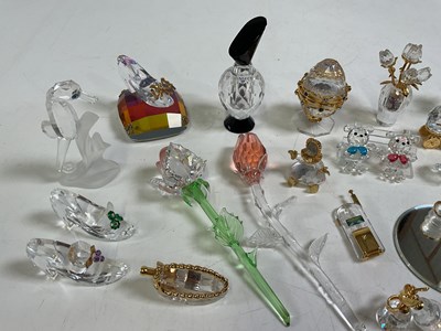 Lot 262 - A group of Swarovski glass ornaments.