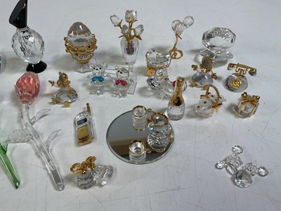 Lot 262 - A group of Swarovski glass ornaments.