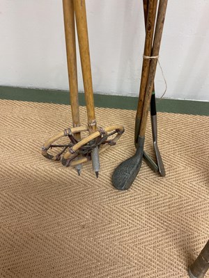Lot 61 - A collection of fishing rods of various sizes,...