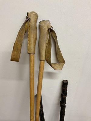 Lot 61 - A collection of fishing rods of various sizes,...