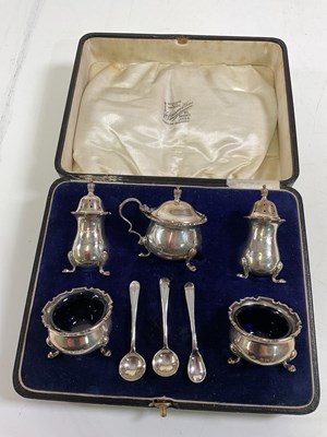 Lot 447 - A boxed hallmarked silver five piece cruet