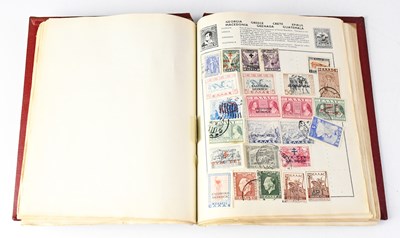 Lot 530 - A 'Quickchange' schoolboy stamp album,...