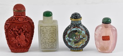 Lot 600 - Four Chinese snuff bottles comprising...