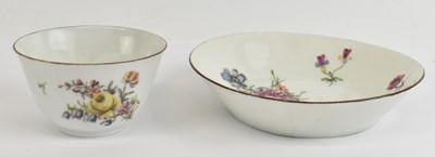 Lot 509 - CHELSEA; a red anchor tea bowl and saucer...