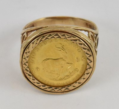 Lot 791 - A 1983 1/10 ounce Krugerrand in 9ct yellow...