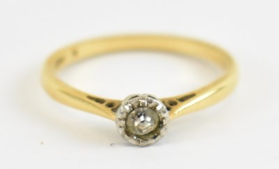 Lot 815 - An 18ct yellow gold diamond solitaire ring set...