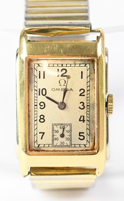 Lot 939 - OMEGA; an 18ct yellow gold cased tank...