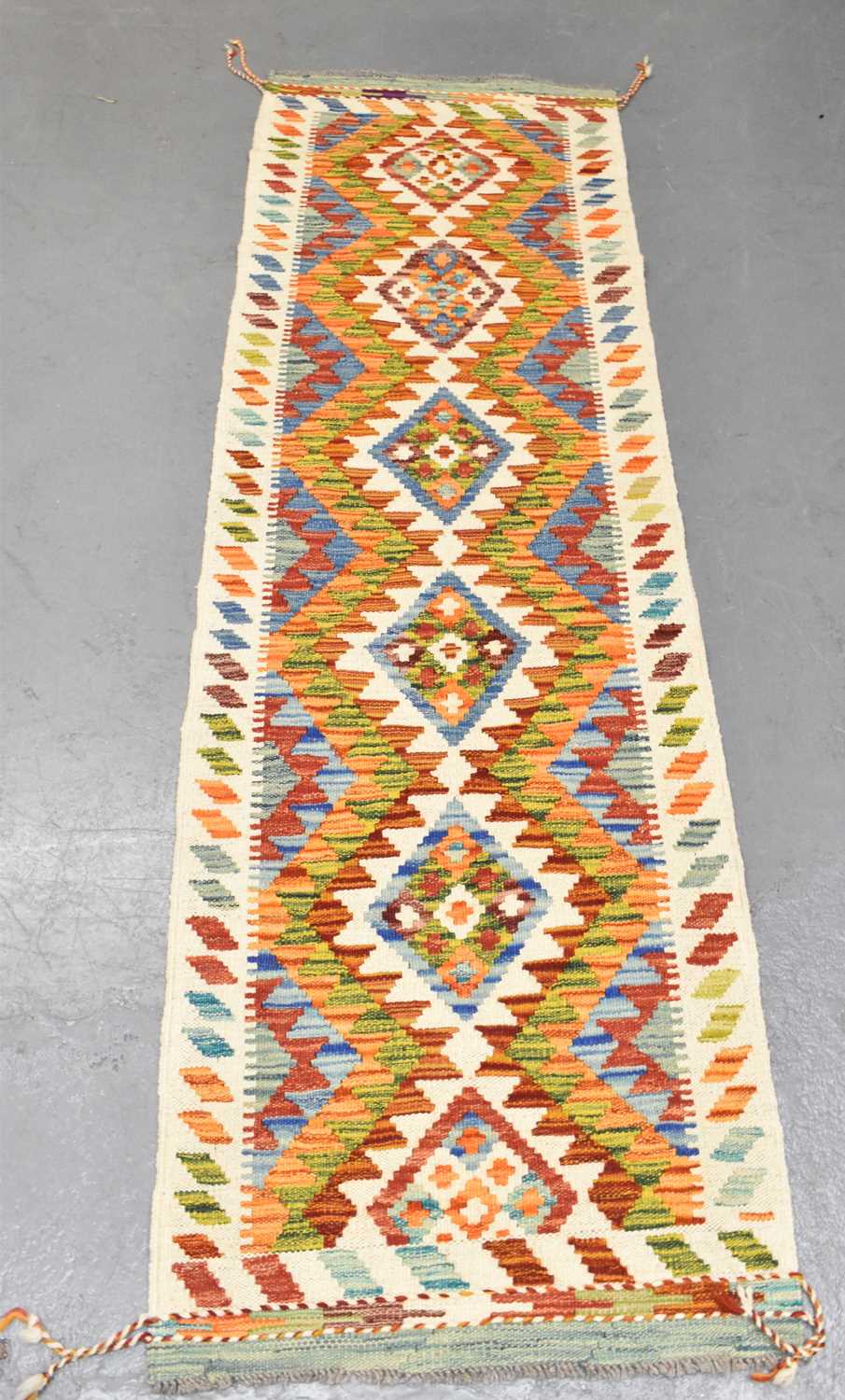 Lot 108 - A handmade Chobi Kilim runner, 198 x 60cm.