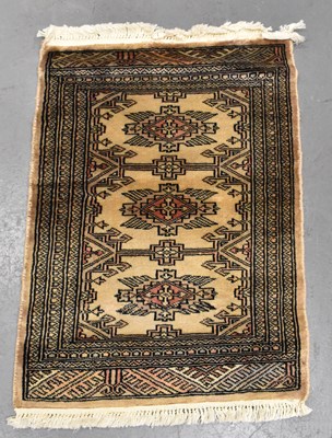 Lot 122 - A handmade Bokhara rug, 75 x 47cm.