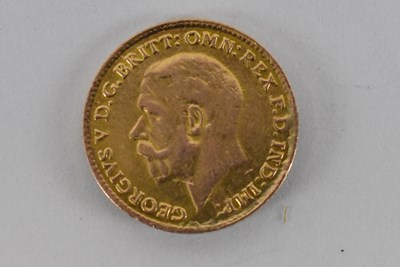 Lot 866 - A George V 1922 quarter sovereign, with...