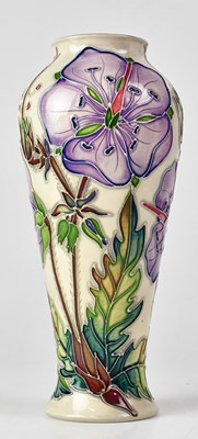 Lot 348 - MOORCROFT; a 'Meadow Cranesbill' pattern cream...