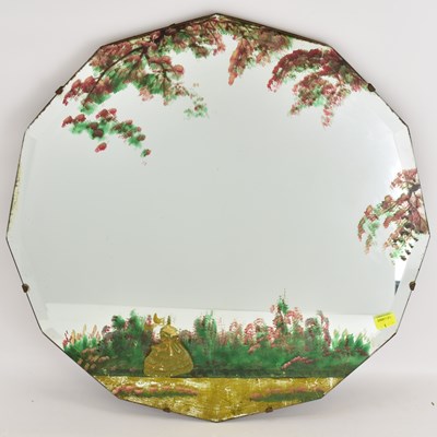Lot 83 - An early 20th century wall mirror with hand...