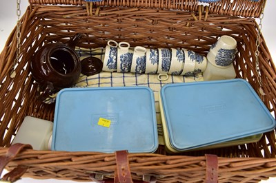 Lot 151 - BREXTON; a vintage picnic set in wicker basket,...