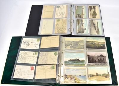 Lot 522 - Two albums of black and white and colour used...