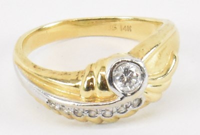 Lot 803 - A 14ct yellow gold ring set with central...