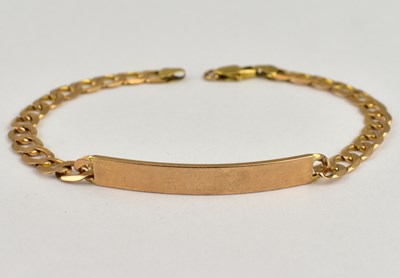 Lot 805 - A 9ct rose gold identity bracelet engraved 'To...