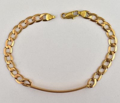 Lot 805 - A 9ct rose gold identity bracelet engraved 'To...