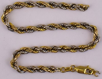 Lot 801 - A 9ct gold fancy link bracelet with lobster...