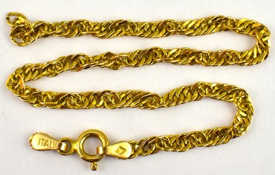 Lot 798 - A 14ct gold bracelet with ring clasp, length...