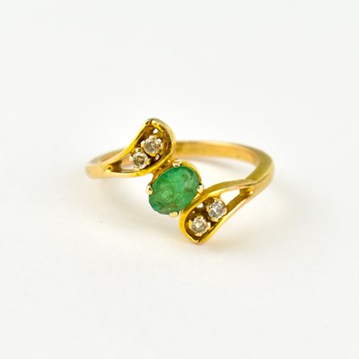 Lot 784 - An Indian gold, emerald and diamond crossover...