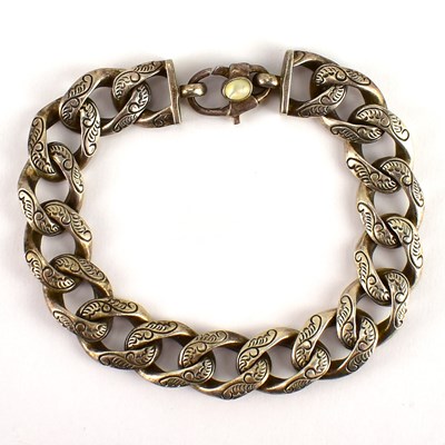 Lot 812 - A Cornish silver flat curb link bracelet with...