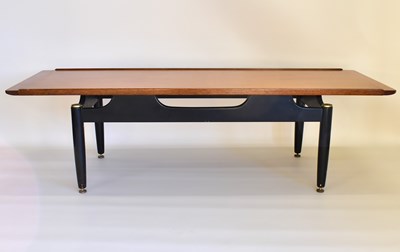 Lot 23 - A 1960s/70s retro coffee table with teak top...