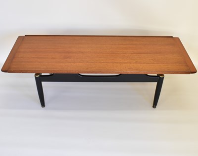 Lot 23 - A 1960s/70s retro coffee table with teak top...