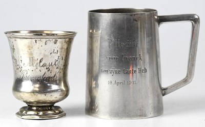 Lot 663 - A German 800 grade silver Christening mug with...