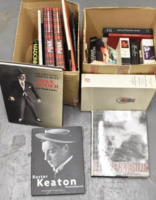 Lot 391 - A box of books relating to music and film,...