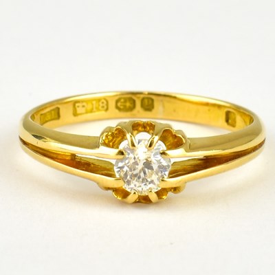 Lot 726 - An 18ct gold ring with claw set brilliant...